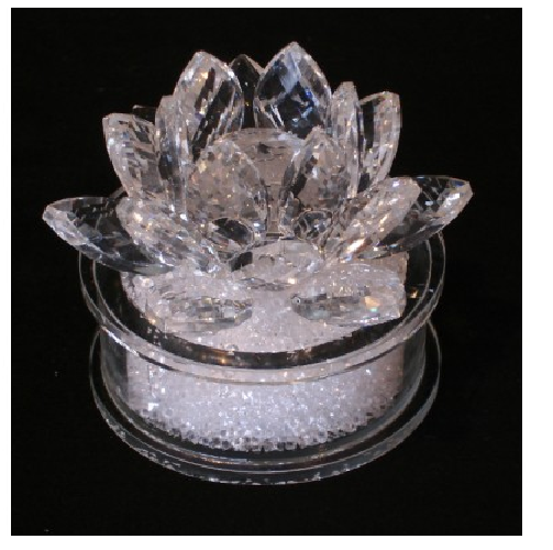 Elegant glass lotus flower ornament on a base, perfect for decor or gifting, measures 8.5cm tall and 9cm wide.