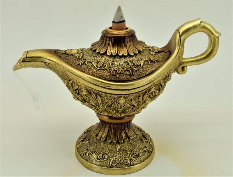Elegant golden lamp backflow incense burner creating a mesmerizing smoke waterfall, perfect for relaxation and decor.