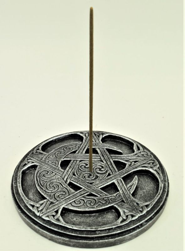 Intricate pentagram incense burner for meditation and rituals, enhancing tranquility and spiritual ambiance in any space.