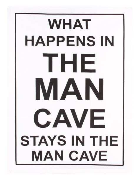 Black tea towel featuring "What Happens In The Man Cave" slogan, perfect for kitchen use or wall decor, size 70 x 50cm.