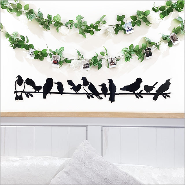 Black wall art featuring New Zealand birds on a branch, crafted from premium ACM, perfect for indoor or outdoor decor.