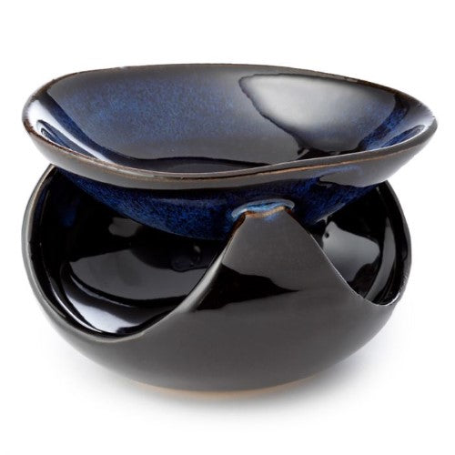 Ceramic oil burners in abstract dark mottled design, perfect for diffusing scents and enhancing home ambiance.
