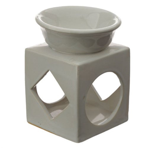 Set of 3 ceramic oil and wax burners with geometric cut-outs, perfect for enhancing ambiance and diffusing scents.