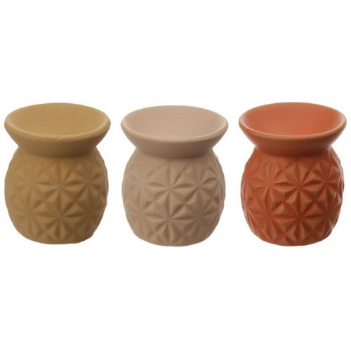 Ceramic oil burner with embossed triangle pattern, perfect for aromatherapy in a compact design, 7.5cm tall. Box of 20 units.