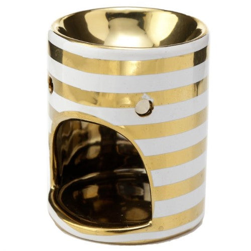 Elegant ceramic oil burner with metallic gold stripe, perfect for creating aromatic ambiance and stylish decor.