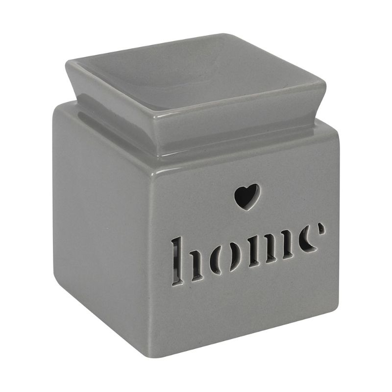 Elegant grey ceramic oil burner with heart and 'home' cut-out design, perfect for creating a calming atmosphere.