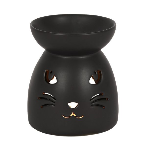 Black ceramic oil burner with cut-out cat face, ideal for Halloween or cozy ambiance, packaged in a colorful gift box.