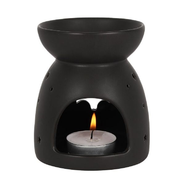 Black ceramic oil burner with bat cut-out design, perfect for Halloween decor and creating cozy aromas.