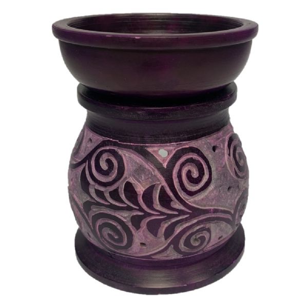 Handcrafted purple Koru Soapstone oil burner, perfect for aromatherapy and creating a calming atmosphere in any room.