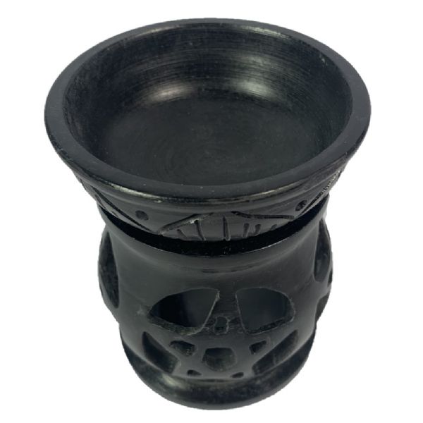 Handcrafted black soapstone oil burner featuring a pentacle design, perfect for aromatherapy and enhancing home ambiance.