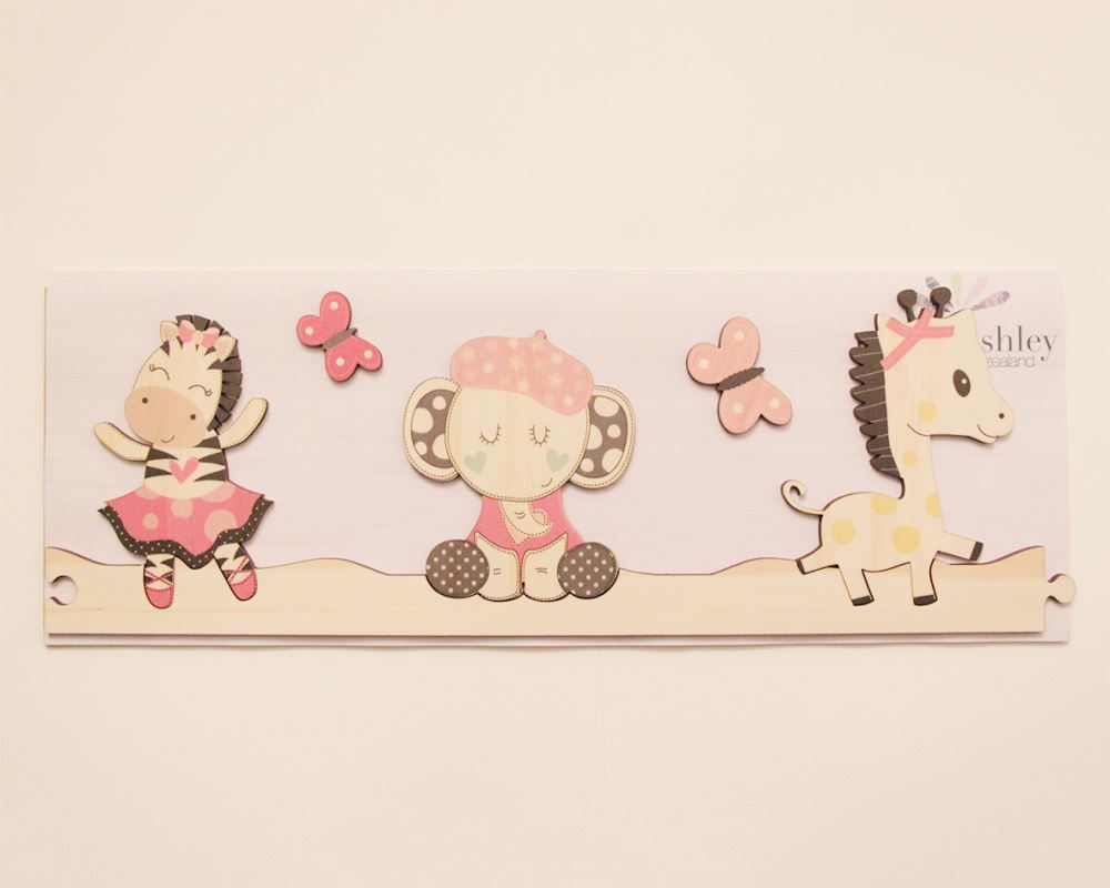 Whimsical jigsaw wall art featuring a mouse, pony, and turtle, perfect for a child's bedroom or play area.