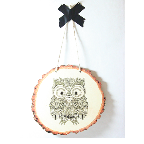 Rustic wood slice wall art featuring a charming owl design, crafted from eco-friendly pine veneer, ready to hang.