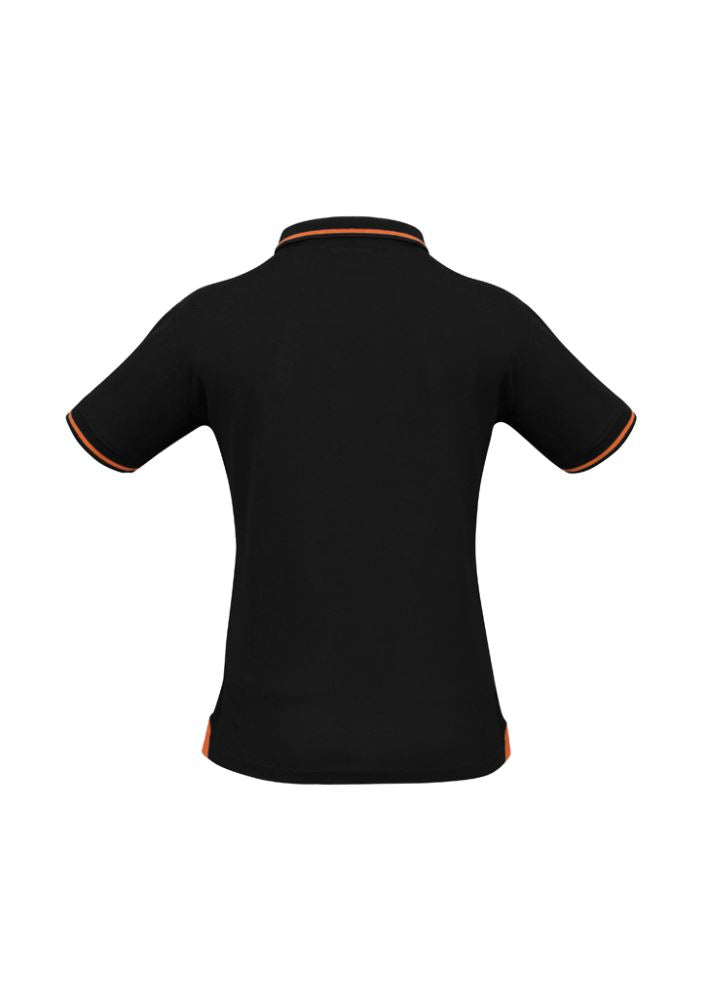 Ladies Jet Polo in Black/Orange, size 18, featuring breathable fabric, stylish contrast hem, and UPF sun protection.