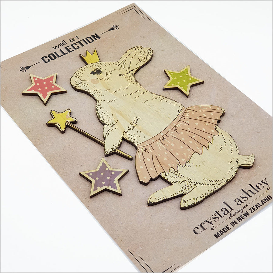 Handcrafted pine wall art featuring charming Bellarina bunnies, perfect for nurseries and adding rustic warmth to any space.