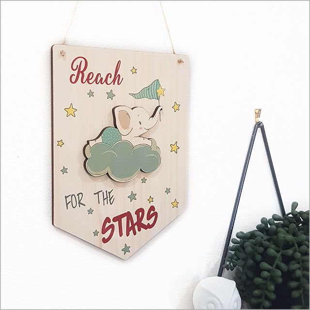 Wall art featuring a decorative pine flag design, crafted from eco-friendly veneer, perfect for inspiring home decor.