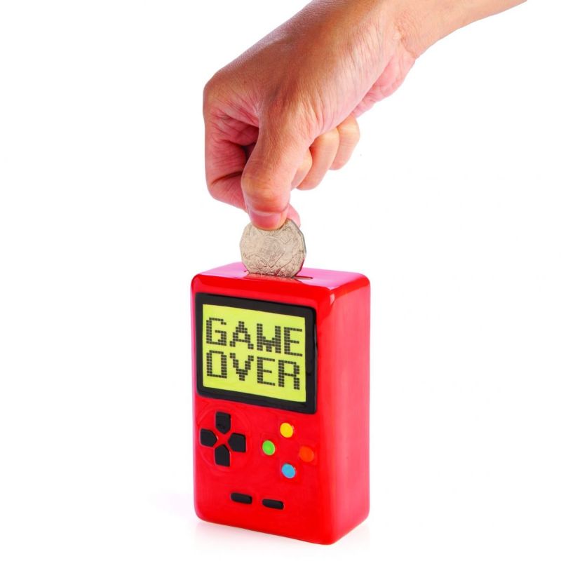 Bright red ceramic money bank shaped like a portable game console, perfect for gamers and nostalgic decor.
