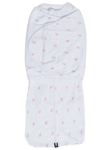 Cozy pink criss-cross baby swaddle with double wrap system and easy zip for quick diaper changes, perfect for restful nights.