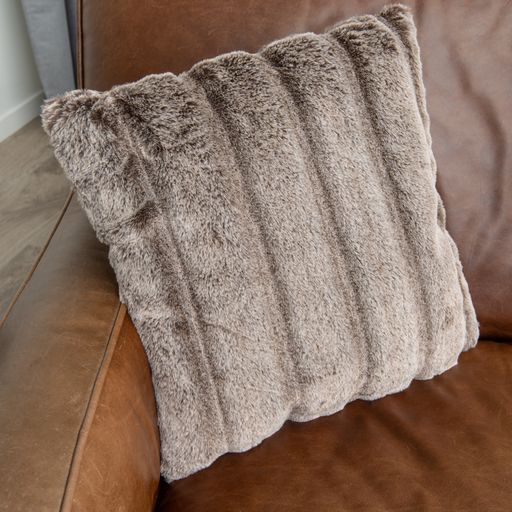 Luxurious 180GSM possum faux fur cushion, offering plush comfort and elegant style for home decor and back support.