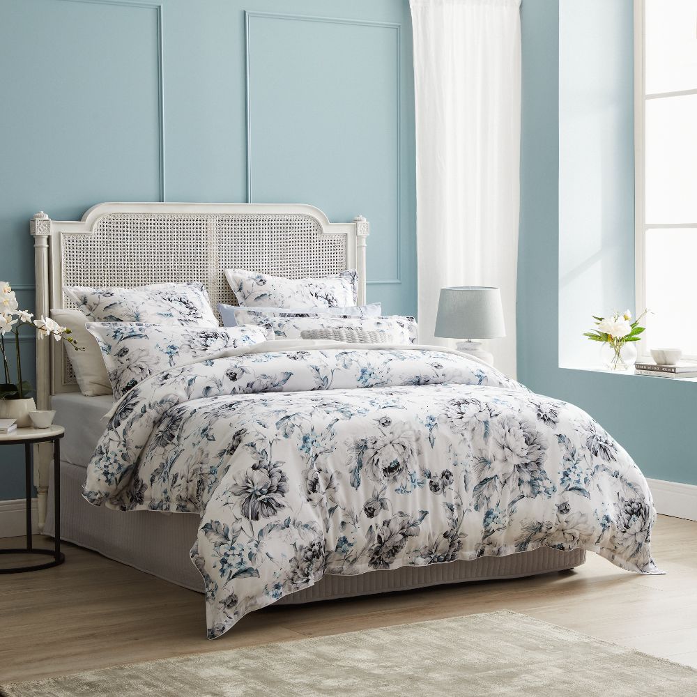 King duvet cover set in Salsbury Grey features an Impressionist-inspired watercolor print in grey, blue, and white on cotton sateen.