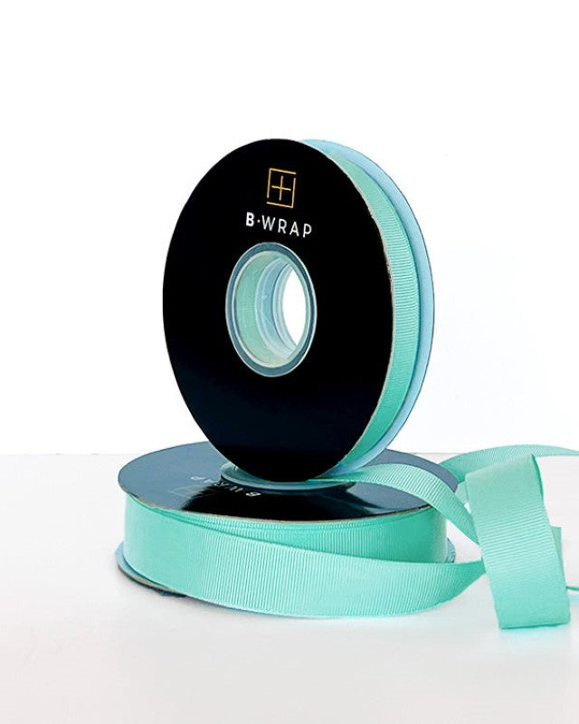 Aqua grosgrain ribbon, 13mm wide and 30m long, perfect for gift wrapping, crafts, and event decor.