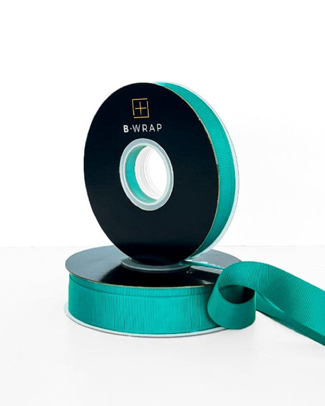 Grosgrain ribbon in jade green, 13mm wide and 30m long, perfect for gift wrapping and DIY projects.