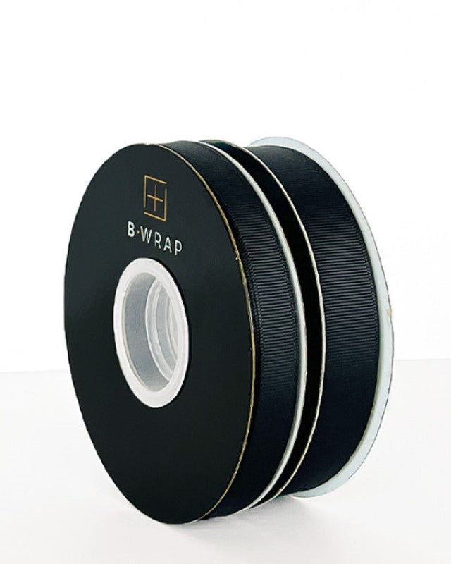 Black grosgrain ribbon, 22mm wide and 30m long, ideal for crafting, gift wrapping, and embellishments with a luxurious finish.