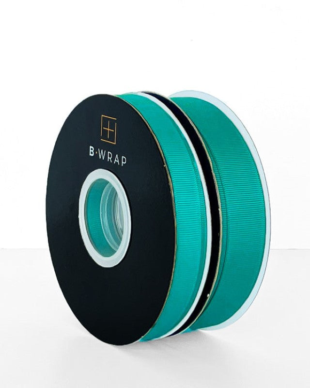 Grosgrain ribbon in jade color, 22mm wide and 30m long, perfect for gift wrapping and DIY projects.