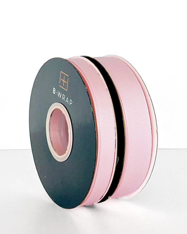 Pale pink grosgrain ribbon, 22mm x 30m, perfect for crafting, gift wrapping, and adding elegance to décor.