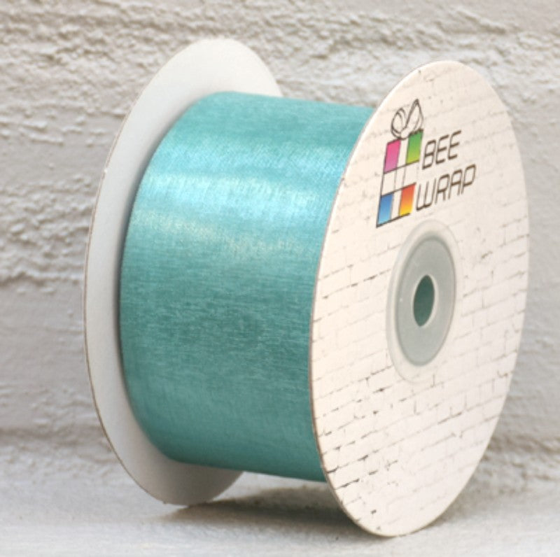Jade organza ribbon, 50mm x 50m, perfect for elegant crafts, gift wrapping, bows, and floral arrangements.