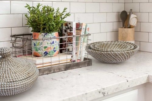 Set of 3 elegant seagrass baskets with plastic weaving, ideal for storage and natural decor in any room.