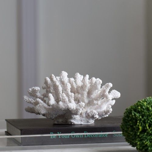 White faux coral ornament crafted from polyresin, showcasing intricate textures for coastal-inspired home decor.