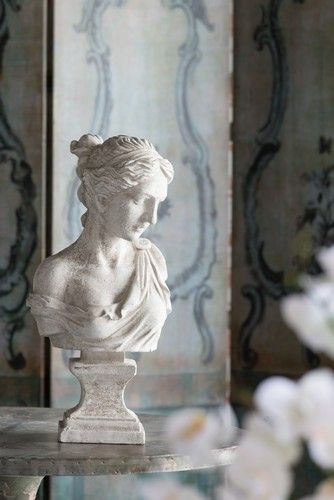 Elegant Magnesium bust sculpture of a woman in classic attire, perfect for enhancing any indoor or outdoor decor.