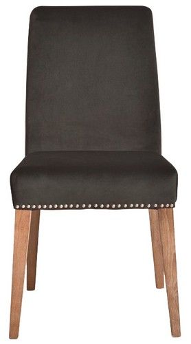 Dark grey velvet dining chair with antique studs, offering luxury and sophistication for any dining space.