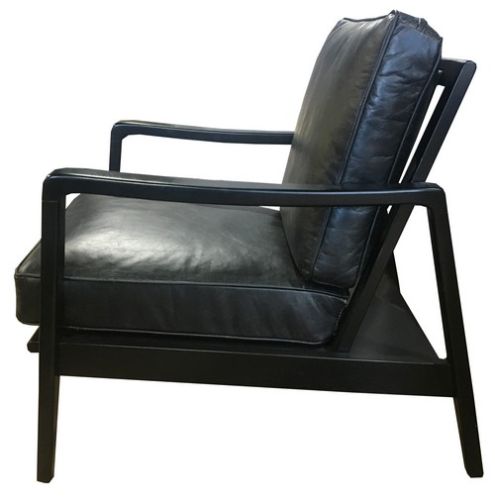 Elegant Leather Occasional Finn Chair in Belon Black with a solid black frame, featuring unique buckle detailing and plush cushioning.