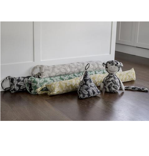 Whimsical palm goat draught stopper, vibrantly colored, keeps out winter drafts while enhancing home decor.