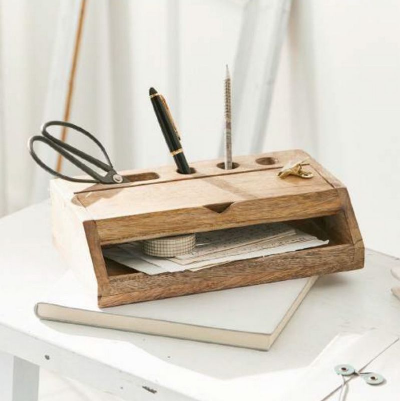 Wooden organizer measuring 25x6.5x15cm, perfect for decluttering and enhancing room decor with a modern minimalist design.