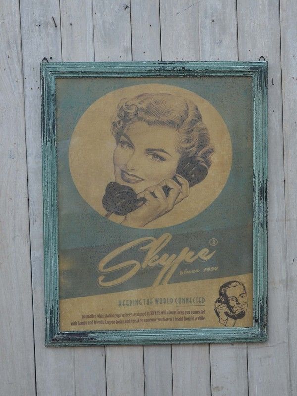 Modern Skype Framed Art in a wooden frame, showcasing vibrant graphics that celebrate digital connectivity.