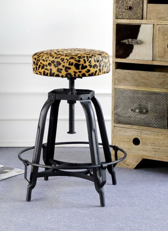 Leopard print leather barstool with adjustable iron base, combining style and comfort for dining or kitchen use.