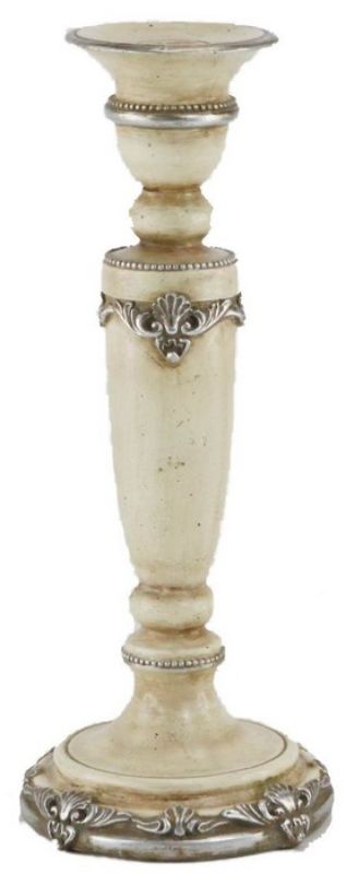 Antiqued cream candle holder with intricate detailing, perfect for adding elegance and warmth to any home decor.