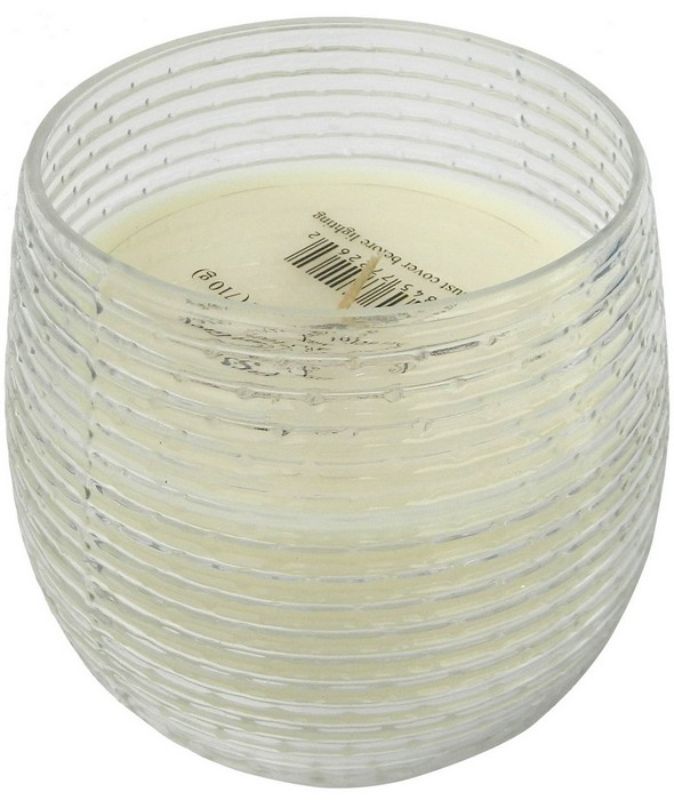 Elegant Earl Grey scented soy wax candle in a gold ribbed glass holder, perfect for creating a welcoming ambiance at home.