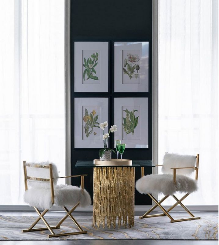 Set of four elegant botanical wall art prints, featuring lush colors and designs to enhance any interior space.