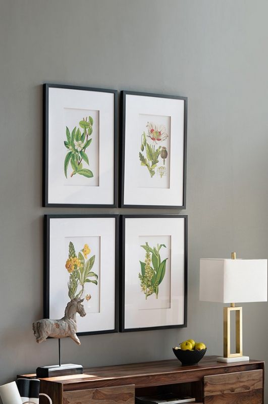Elegant botanical wall art set of 4, showcasing lush designs in durable frames, perfect for enhancing any indoor space.