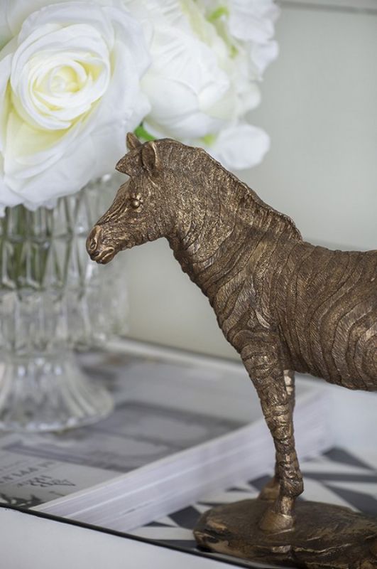 Metallic copper finish zebra ornament, 24cm tall, showcasing intricate details for stylish home decor accents.