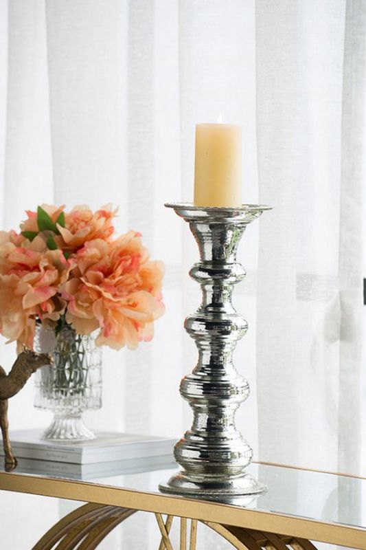 Tall antiqued silver glass pillar candle holder with ribbed detail, perfect for elegant home decor and ambiance enhancement.