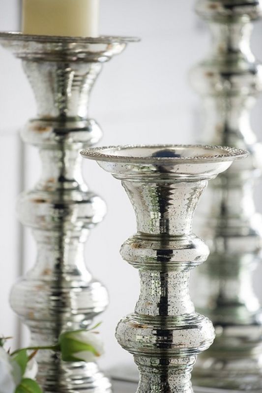 Elegant 30cm pillar candle holder in antiqued silver glass, featuring ribbed detailing and a round base for stylish decor.