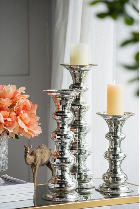 Elegant 30cm antiqued silver glass pillar candle holder with ribbed detailing, perfect for enhancing home decor and creating ambiance.
