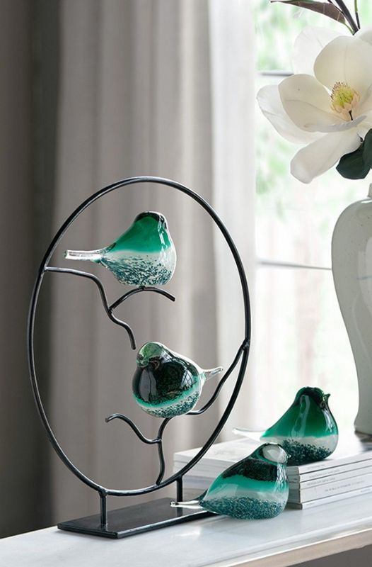 Set of 2 vibrant green glass birds, elegantly crafted to enhance modern home decor with whimsical charm.