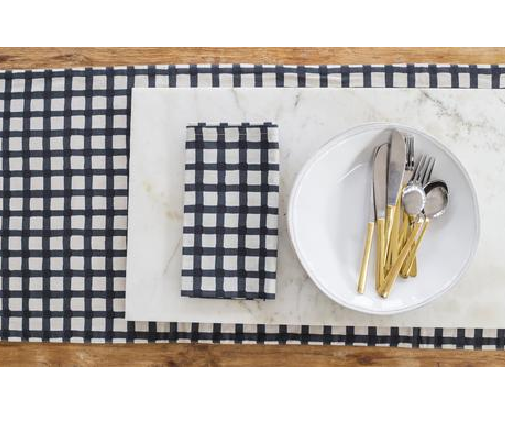 Elegant reversible table runner featuring raven Margherita and gingham prints, perfect for festive dining decor.