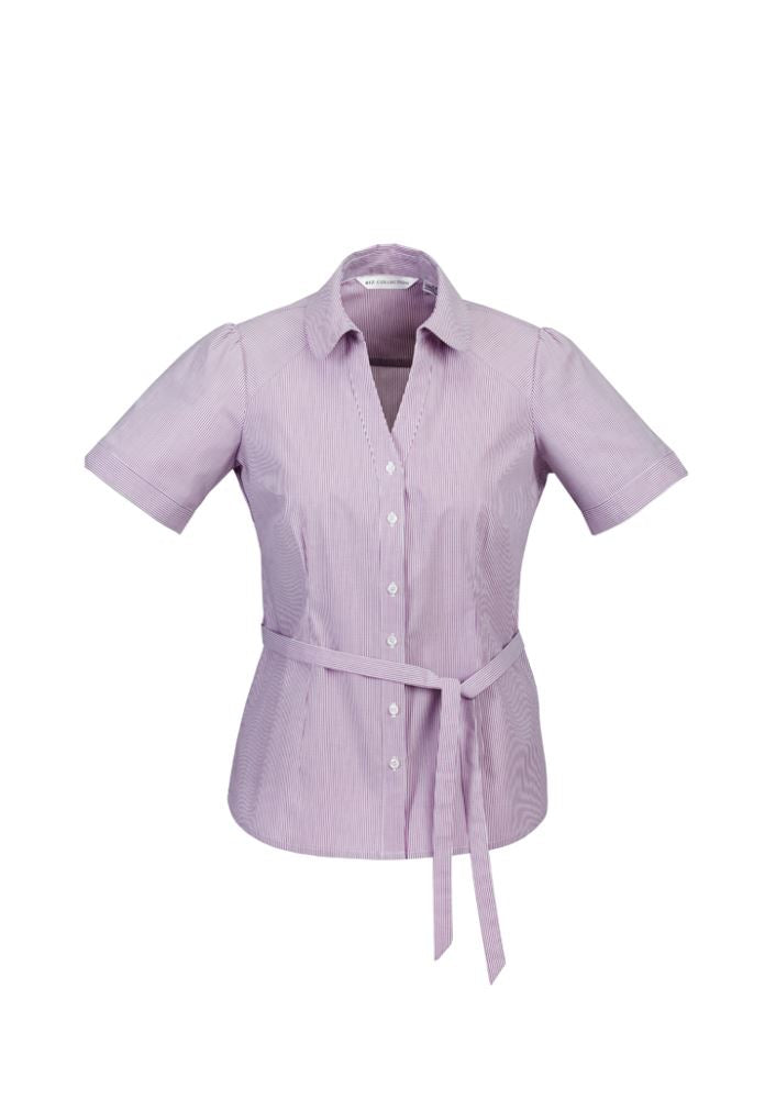 Ladies Berlin Y-Line Shirt in Grape, size 18, featuring a Peter Pan collar, shoulder pleats, and removable waist tie for versatility.