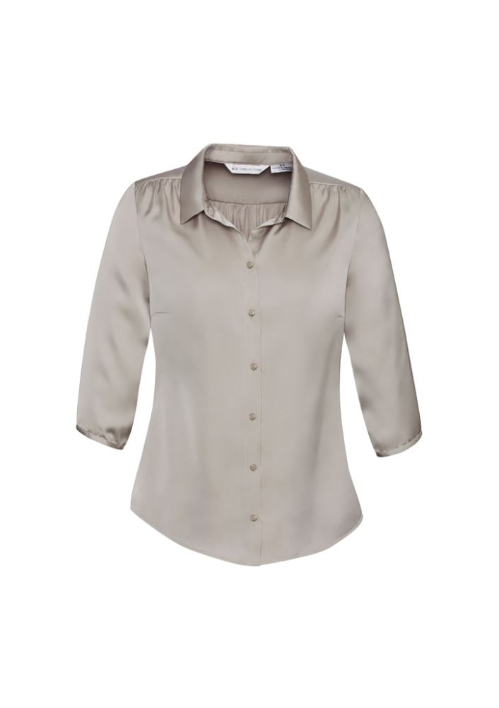 Ladies Shimmer Blouse in Champagne, Size 14, features elegant polyester satin, pleat details, 3/4 sleeves, and chic button accents.